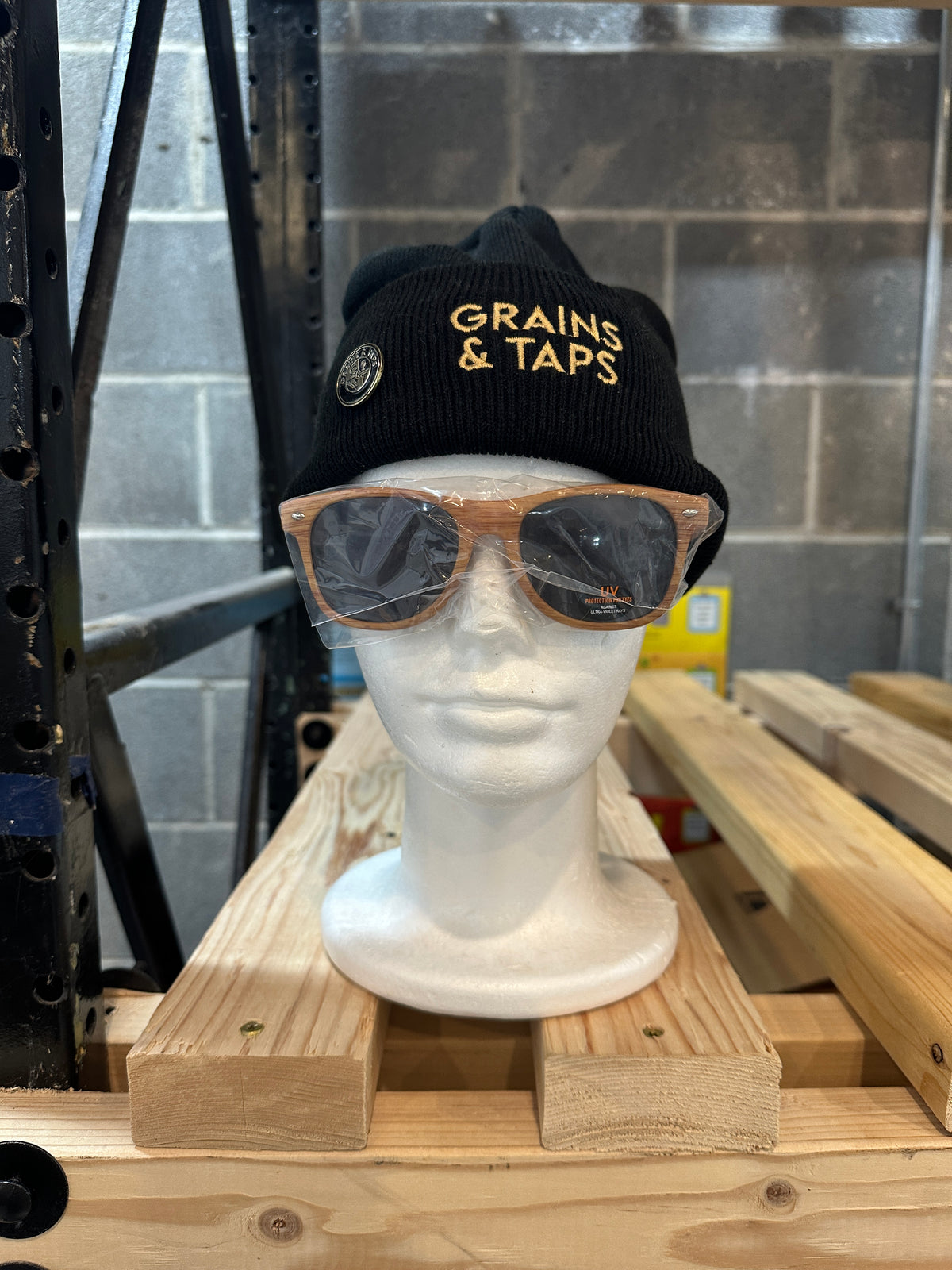 Lot 1927 Head with Stocking Cap, Pin, and Sunglasses