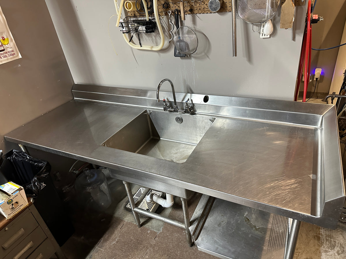 Lot 120 Large Stainless Sink with shelf