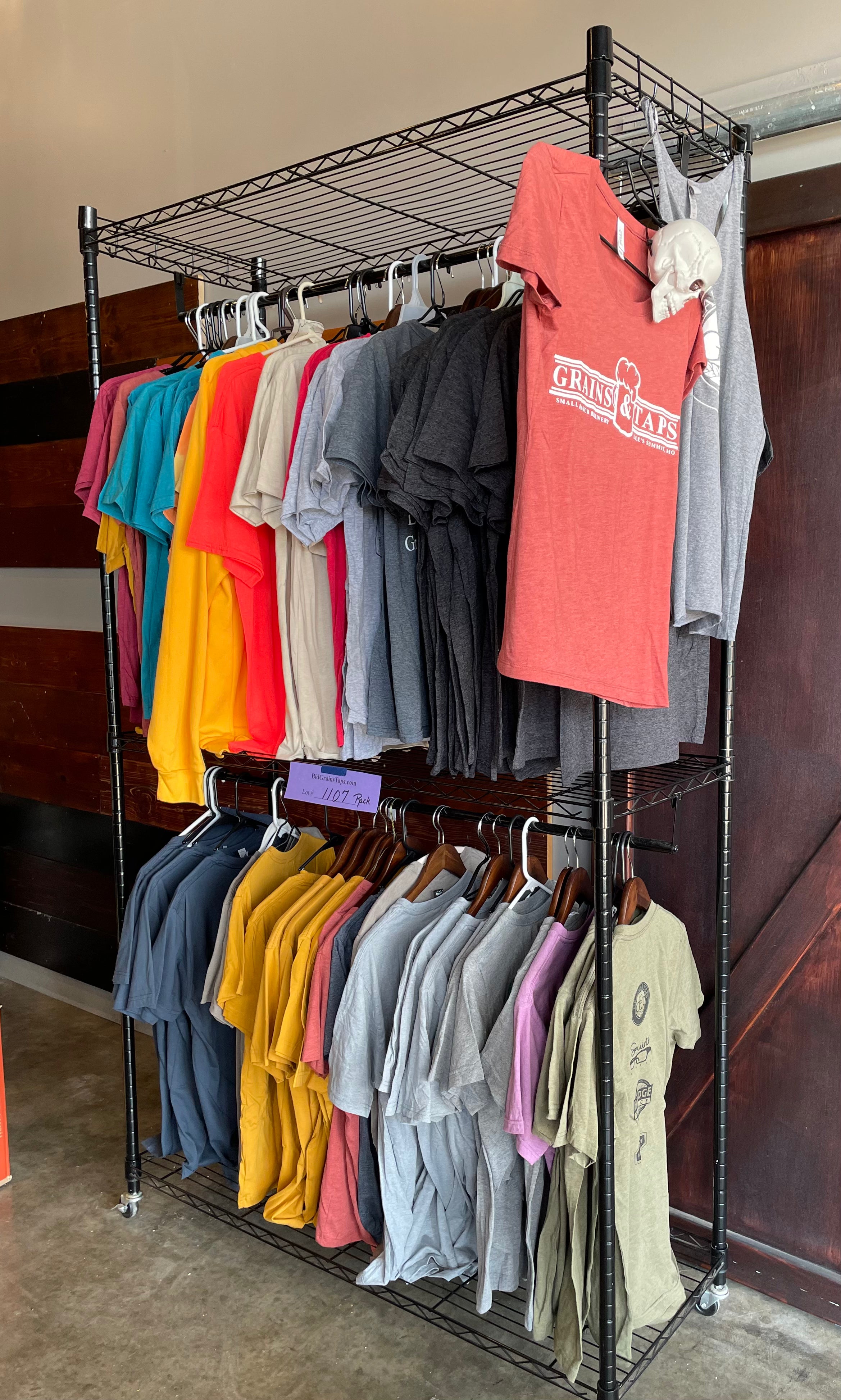 Lot 1107 Hanging Shelf Rack on Casters